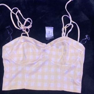Rue 21 set. Yellow plaid. Still has tags on and never work before.